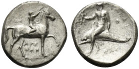 Southern Apulia, Tarentum, c. 320-280 BC. AR Nomos (21.5mm, 7.55g, 6h). Youth on horseback r., crowning horse; ΣA to l., APE/ΘΩN in two lines below. R...