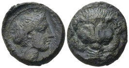 Bruttium, Rhegium. 350-270 BC. Æ (18mm, 6,16g). Lion's scalp facing. R/ Head of Apollo r., hair bound by laurel wreath. SNG ANS 698ff. Near VF