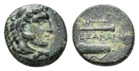 Kings of Macedon, Philip III Arrhidaios (323-317 BC). Æ Unit (16mm, 6.13g). In the name of Alexander III, Tarsos. Head of Herakles r., wearing lion sk...