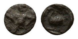 Cilicia, Mallos, c. 440-390 BC. AR Obol (9mm, 0.74g). Half-length bust of winged figure facing, head r., holding disk. R/ Swan standing l. within incu...