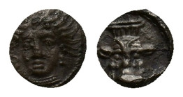 Cilicia, Uncertain, 4th century BC. AR Obol (8.5mm, 0.64g). Female head (Arethusa?) facing slightly l. R/ Facing head of Bes. Göktürk 44; SNG BnF 486;...