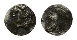 Cilicia, Uncertain. Hemiobol (4th century BC). AR Hemiobol (7mm, 0.29g). Head of Herakles l., wearing lion skin. R/ Helmeted head l. Unpublished in th...