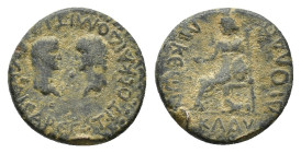 Titus and Domitian (Caesares, 69-81). Lycaonia, Laodicea Combusta. Æ (18.5mm, 5.27g). Confronted bare heads of Titus and Domitian. R/ Cybele seated l....