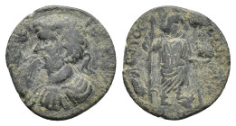 Commodus (177-192). Pisidia, Antioch. Æ (20mm, 4.57g). Laureate, draped and cuirassed bust l. R/ Mên standing r., with foot on bucranium, holding scep...
