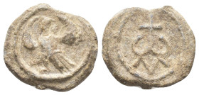 Byzantine Pb Seal, c. 7th-12th century (23mm, 12.26g). Eagle standing l., head r., with wings spread. R/ Monogram. Near VF