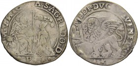Nicolò Sagredo doge CV, 1675-1676. Mezzo ducato, AR 10,50 g. S M V NICOLA SAGREDO D S. Marco nimbato, seduto a s. e benedicente, consegna il vessillo ...