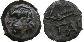 Cimmerian Bosporus, Panticapaeum (Pantikapaion) Æ Circa 304-250 BC.
1.34g. 13mm. AU/AU Satyr left/ ΠΑΝ Bow and arrow. MacDonald 116/1. 