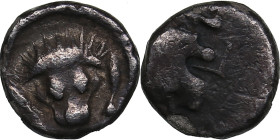 Satraps of Caria AR Hemiobol. Circa 395-377 BC.
0.48g. 8mm. VF/VF Lions head facing/ Lions head right. SNG Keckman 837-840.
