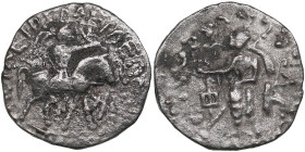 Indo-Skythians. AR Drachm. Azes. Circa 58-12 BC.
1.92g. 15mm. VF/VF Azes on horseback right, holding whip/ Zeus standing facing. 