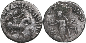 Indo-Skythians. AR Drachm. Azes. Circa 58-12 BC.
2.07g. 14mm. F/F Azes on horseback right, holding whip/ Zeus standing facing. 