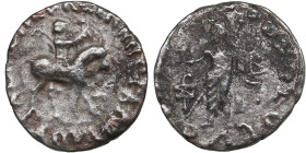Indo-Skythians. AR Drachm. Azes. Circa 58-12 BC.
1.80g. 16mm. F/F Azes on horseback right, holding whip/ Zeus standing facing. 