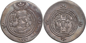 Sasanian Kingdom AR Drachm - Khosrau II (AD 591-628)
3.45g. 30mm. VF/VF+ With Afid in obverse. DA mint. Crowned bust right/ Fire altar with ribbons an...