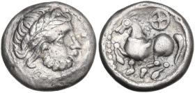 Celtic World. Celtic, Eastern Europe. The Skordoski. AR Drachm, 3rd century BC. Obv. Stylized head of Zeus right. Rev. Stylized horse left; above, whe...