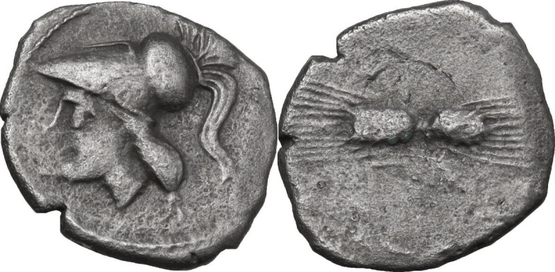 Greek Italy. Northern Apulia, Arpi. AR Diobol, 215-212 BC-. Obv. Helmeted head o...