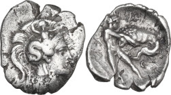 Greek Italy. Southern Apulia, Tarentum. AR Diobol, 380-325 BC. Obv. Head of Athena right, wearing helmet decorated with Scylla. Rev. Herakles fighting...