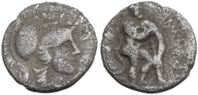 Greek Italy. Southern Apulia, Tarentum. AR Diobol, 280-228 BC. Obv. Head of Athena right, wearing Corinthian helmet. Rev. Herakles fighting lion right...