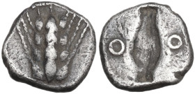 Greek Italy. Southern Lucania, Metapontum. AR Obol, c. 470-440 BC. Obv. Ear of barley with five grains. Rev. Incuse barley grain; flanked by annulets ...