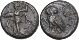 Greek Italy. Southern Lucania, Metapontum. AE 14 mm, 250-207 BC. Obv. Athena Promachos left. Rev. Owl standing left, had facing, wings closed, on ear ...