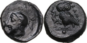 Sicily. Kamarina. AE Onkia, 425-405 BC. Obv. Helmeted head of Athena left. Rev. Owl standing left, head facing, wings closed, holding lizard; in exerg...