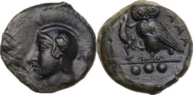 Sicily. Kamarina. AE Tetras, 425-405 BC. Obv. Helmeted head of Athena left. Rev. Owl standing left, head facing, wings closed, holding lizard; in exet...