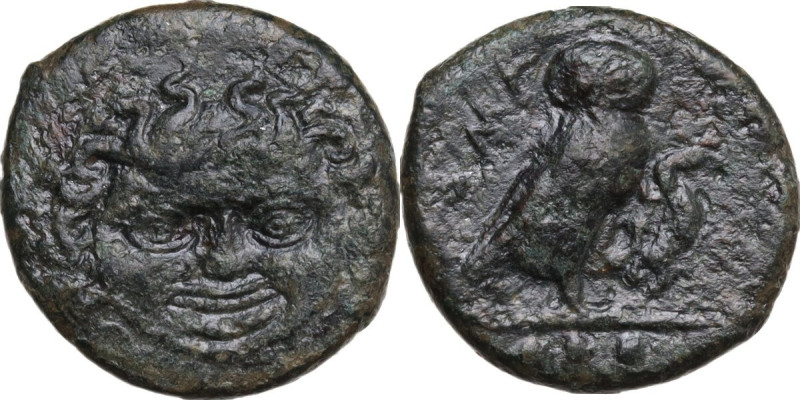 Sicily. Kamarina. AE Tetras, 425-405 BC. Obv. Gorgoneion. Rev. Owl standing righ...