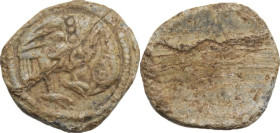 PB Tessera, Asia Minor, 1st-3rd century AD. D/ Bird standing right, head lowered. R/ Blank. PB. 4.10 g. 16.00 mm. About EF.