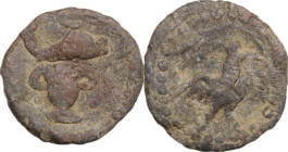 PB Tessera, Asia Minor, 1st-4th century AD. D/ Dolphin and vase. R/ Rooster right. PB. 2.70 g. 16.00 mm. About VF.