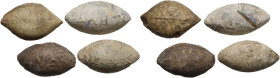 Lot of four lead slingshot bullets, (3) with inscription and (1) with sun.