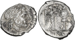 Anonymous. Victoriatus, uncertain Sicilian mint, 214-215 BC. Obv. Laureate head of Jupiter right. Rev. Victory standing right, crowning trophy; in exe...