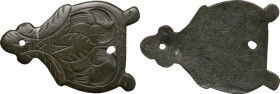 Bronze applique with floreal pattern. Early medieval. 50 x 32 mm.