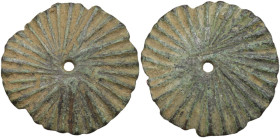Bronze pendant or part of cutting tool. Roman period. Diameter: 26 mm.