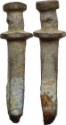 Bronze pendant in the shape of a gladius (Roman short sword). Roman period. 40 mm.