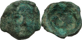 Bronze head. Roman period. 23 x 23 mm.