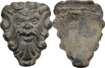 Bronze face-shaped applique. Roman period, 1st-3rd century AD. 38 x 32 mm.