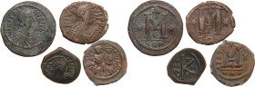 The Byzantine Empire. Lot of 4 unclassified AE Denominations; including: Anastasius, Justin I, Justin II, Heraclius. AE. About VF:Good F.