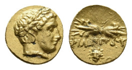 KINGS OF MACEDON. Philip II (359-336 BC). GOLD 1/12 Stater. Pella.
Obv: Laureate head of Apollo right.
Rev: ΦΙΛΙΠΠΟΥ.
Thunderbolt; below, facing he...