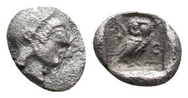 ATTICA. Athens. (Circa 500/490-485/80 BC). AR Obol.
Obv: Helmeted head of Athena right.
Rev: AΘE.
Owl standing right, head facing; olive sprig and ...