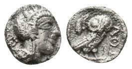 ATTICA. Athens (Circa 454-404 BC). AR Obol
Obv: Helmeted head of Athena right.
Rev: AΘE.
Owl standing right, head facing; olive sprig and crescent ...