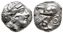 ATTICA. Athens (Circa 454-404 BC). AR Tetradrachm.
Obv: Helmeted head of Athena right, with frontal eye. Countermark: Star.
Rev: AΘE.
Owl standing ...