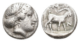 TROAS. Antandros. (5th century BC). AR Diobol.
Obv: Head of Artemis Astyrene right; hair bound.
Rev: ANTA / N.
Goat standing right within incuse sq...
