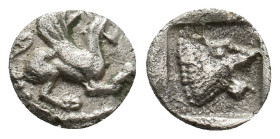 TROAS. Assos. (Circa 500-450 BC). AR Obol.
Obv: Griffin seated to right, raising forepaw
Rev: Head of roaring lion to right within shallow incuse sq...
