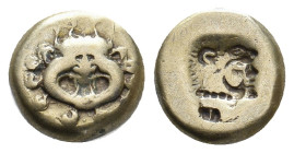 LESBOS. Mytilene. (Circa 521-478 BC). EL Hekte.
Obv: Facing gorgoneion.
Rev: Incuse head of Herakles right, wearing lion skin; rectangular punch to ...