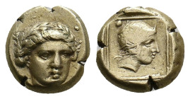 LESBOS. Mytilene. (Circa 412-378 BC). EL Hekte.
Obv: Laureate head of Apollo facing slightly right.
Rev: Head of Amazon right, wearing ornate helmet...