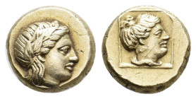LESBOS. Mytilene. (Circa 377-326 BC). EL Hekte.
Obv: Laureate head of Apollo (or Dionysos?) right.
Rev: Female head (Artemis?) right within linear s...