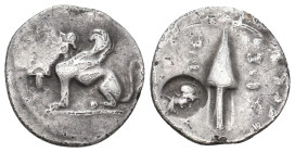 IONIA. Chios. (Circa 170-120 BC). AR Drachm.
Obv: Sphinx seated left; grape bunch to left.
Rev: Amphora within wreath. Countermark; Athena head with...