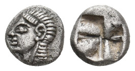 IONIA. Kolophon. (Late 6th century BC). AR Obol.
Obv: Archaic male head (of Apollo?) left.
Rev: Quadripartite incuse square.
Cf. SNG Kayhan 342 (he...
