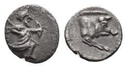 PERSIA. Achaemenid Empire. Time of Artaxerxes II to Darios III (4th century BC).AR Hemiobol
Uncertain mint in Caria or Ionia.
Obv: [ΔH]
Persian kin...