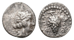 CARIA. Myndos. (2nd-1st centuries BC). AR Obol. Uncertain magistrate.
Obv: Head of Dionysos right, wearing ivy wreath.
Rev: Grape bunch.
BMC 13 var...