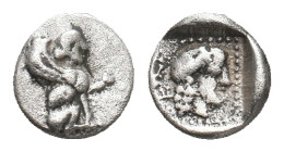 DYNASTS OF LYCIA. Uvug. Uncertain mint. (Circa 470-440 BC). AR Obol.
Obv: Sphinx seated right, raising forepaw.
Rev: Female head right within pellet...