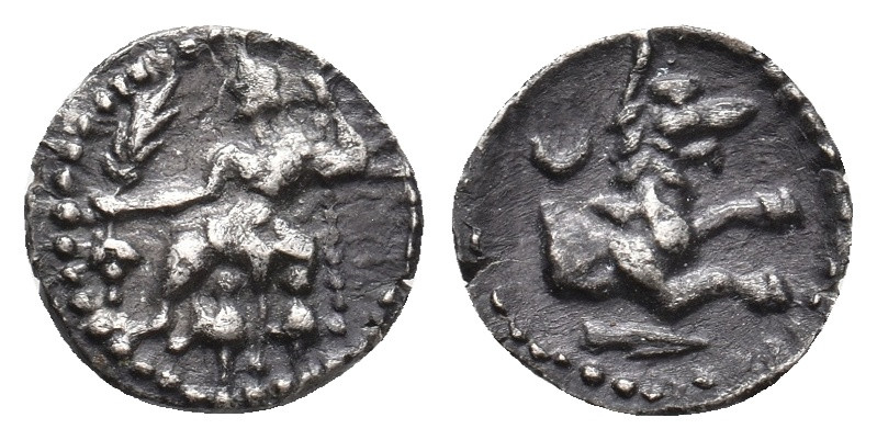 LYCAONIA. Laranda. (4th century BC). AR Obol
Obv: Baaltars seated left, holding...